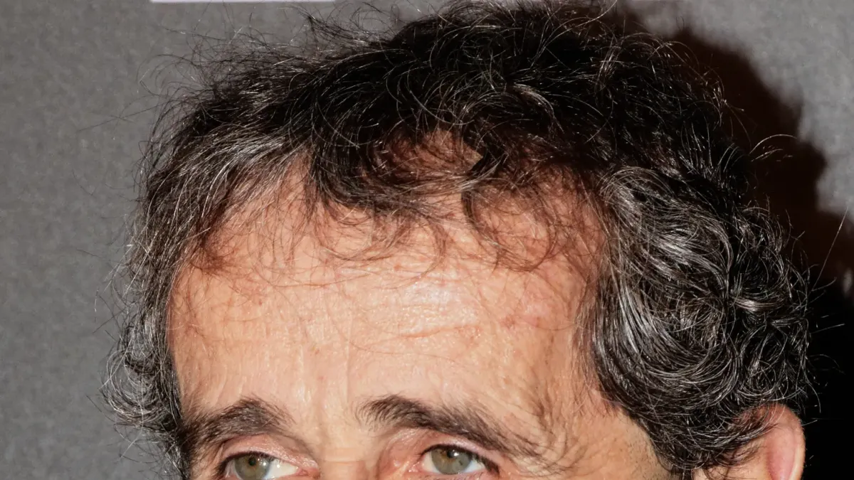 Alain Prost i ett licensierat motorsportfoto.
