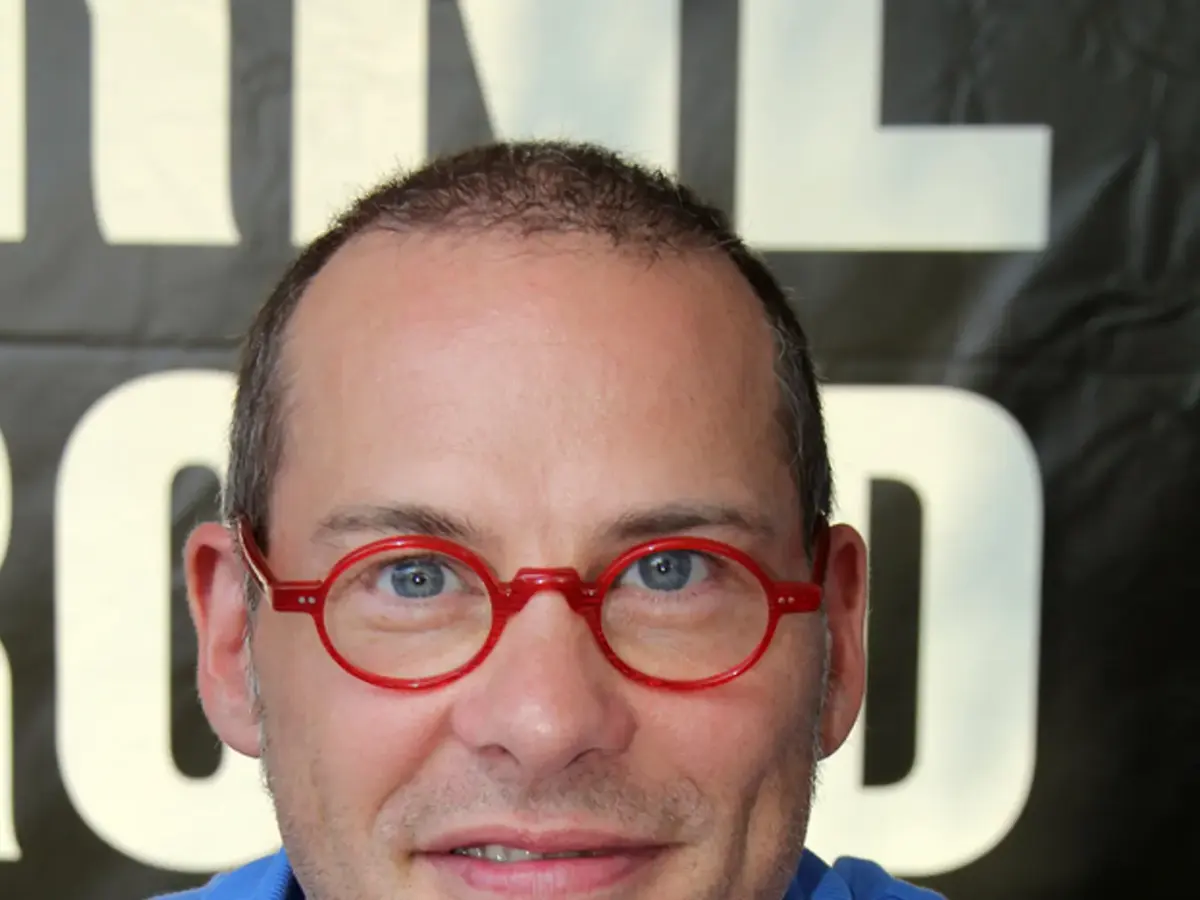 Jacques Villeneuve i ett licensierat motorsportfoto.